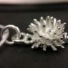 ujo_rocks_hedgehog_pendant_sterling_silver_side