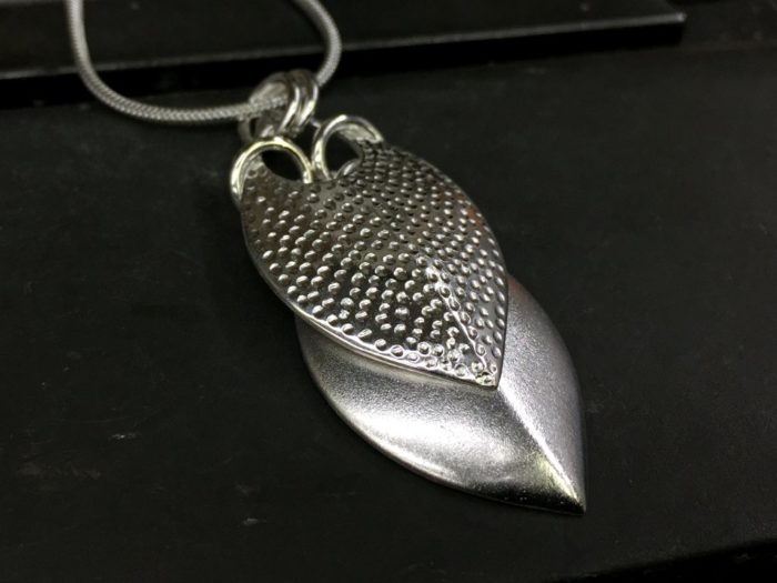 ujo_rocks_double_leaf_pendant_sterling_silver_frosted_hammered_top
