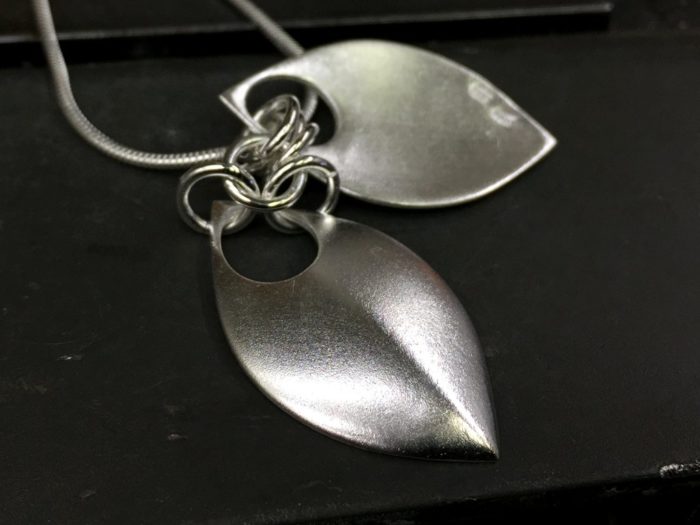 ujo_rocks_double_leaf_pendant_sterling_silver_frosted_hammered_top2