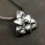 ujo_rocks_lily_pendant_sterling_silver_frosted_oxidised_front