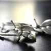 ujo_rocks_buzz_lightbutt_ville_valopylly_firefly_earrings_sterling_silver_glow_in_the_dark_frosted_daytime_side