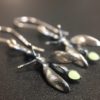 ujo_rocks_buzz_lightbutt_ville_valopylly_firefly_earrings_sterling_silver_glow_in_the_dark_frosted_oxidised_daytime_front