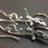 ujo_rocks_buzz_lightbutt_ville_valopylly_firefly_earrings_sterling_silver_glow_in_the_dark_frosted_oxidised_daytime_side