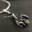ujo_rocks_buzz_lightbutt_ville_valopylly_firefly_pendant_sterling_silver_glow_in_the_dark_polished_daytime_front