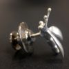 ujo_rocks_buzz_lightbutt_ville_valopylly_firefly_pin_sterling_silver_glow_in_the_dark_frosted_daytime_side