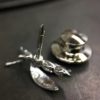 ujo_rocks_buzz_lightbutt_ville_valopylly_firefly_pin_sterling_silver_glow_in_the_dark_polished_daytime_back