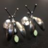 ujo_rocks_buzz_lightbutt_ville_valopylly_firefly_stud_earrings_sterling_silver_glow_in_the_dark_frosted_oxidised_daytime_front
