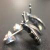 ujo_rocks_buzz_lightbutt_ville_valopylly_firefly_stud_earrings_sterling_silver_glow_in_the_dark_frosted_oxidised_daytime_side