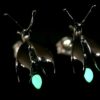 ujo_rocks_buzz_lightbutt_ville_valopylly_firefly_stud_earrings_sterling_silver_glow_in_the_dark_polished_nighttime_front