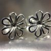 ujo_rocks_daisy_stud_earrings_sterling_silver_polished_front