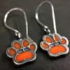 ujo_rocks_paw_earrings_sterling_silver_orange_glow_in_the_dark_frosted_oxidised_daytime_back