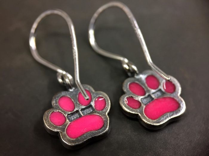 ujo_rocks_paw_earrings_sterling_silver_pink_glow_in_the_dark_frosted_oxidised_daytime_back