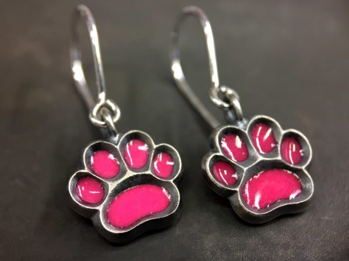 ujo_rocks_paw_earrings_sterling_silver_pink_glow_in_the_dark_frosted_oxidised_daytime_front