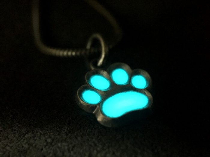 ujo_rocks_paw_pendant_sterling_silver_aqua_glow_in_the_dark_frosted_oxidised_nighttime_front