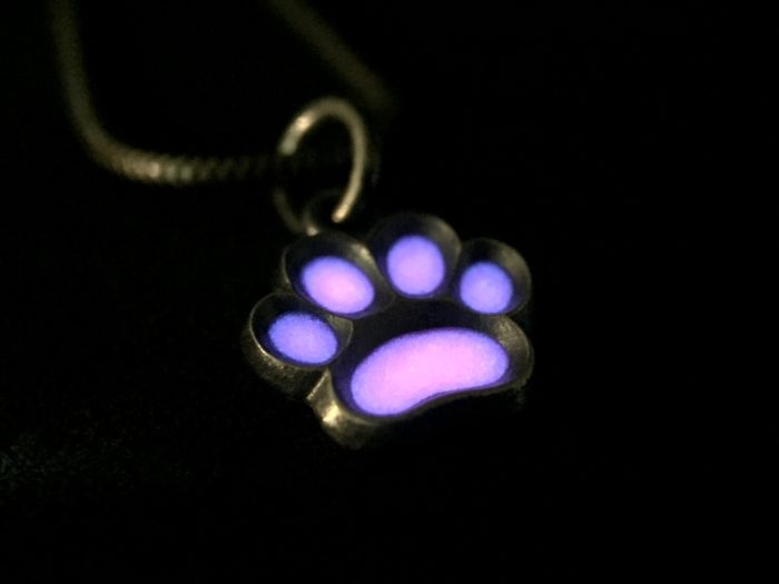 ujo_rocks_paw_pendant_sterling_silver_pink_glow_in_the_dark_frosted_oxidised_nighttime_front