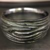 ujo_rocks_tree_bark_ring_sterling_silver_aqua_glow_in_the_dark_polished_daytime_front