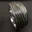 ujo_rocks_tree_bark_ring_sterling_silver_aqua_glow_in_the_dark_polished_daytime_top