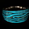 ujo_rocks_tree_bark_ring_sterling_silver_aqua_glow_in_the_dark_polished_nighttime_front